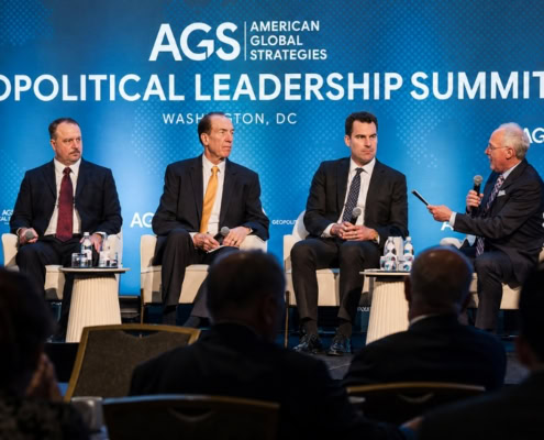 AGS team discussing geopolitical consulting at the Geopolitical Leadership Summit