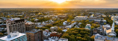Aerial city view representing political risk services and planning for global uncertainty