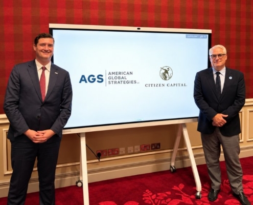 Representatives of American Global Strategies and Citizen Capital pose at a business meeting.