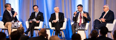 Business leaders discuss AI policy and strategic responses during a panel discussion.