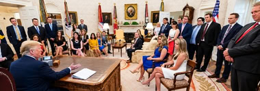 Business leaders meet with U.S. officials in the White House to discuss policy and strategic decisions.